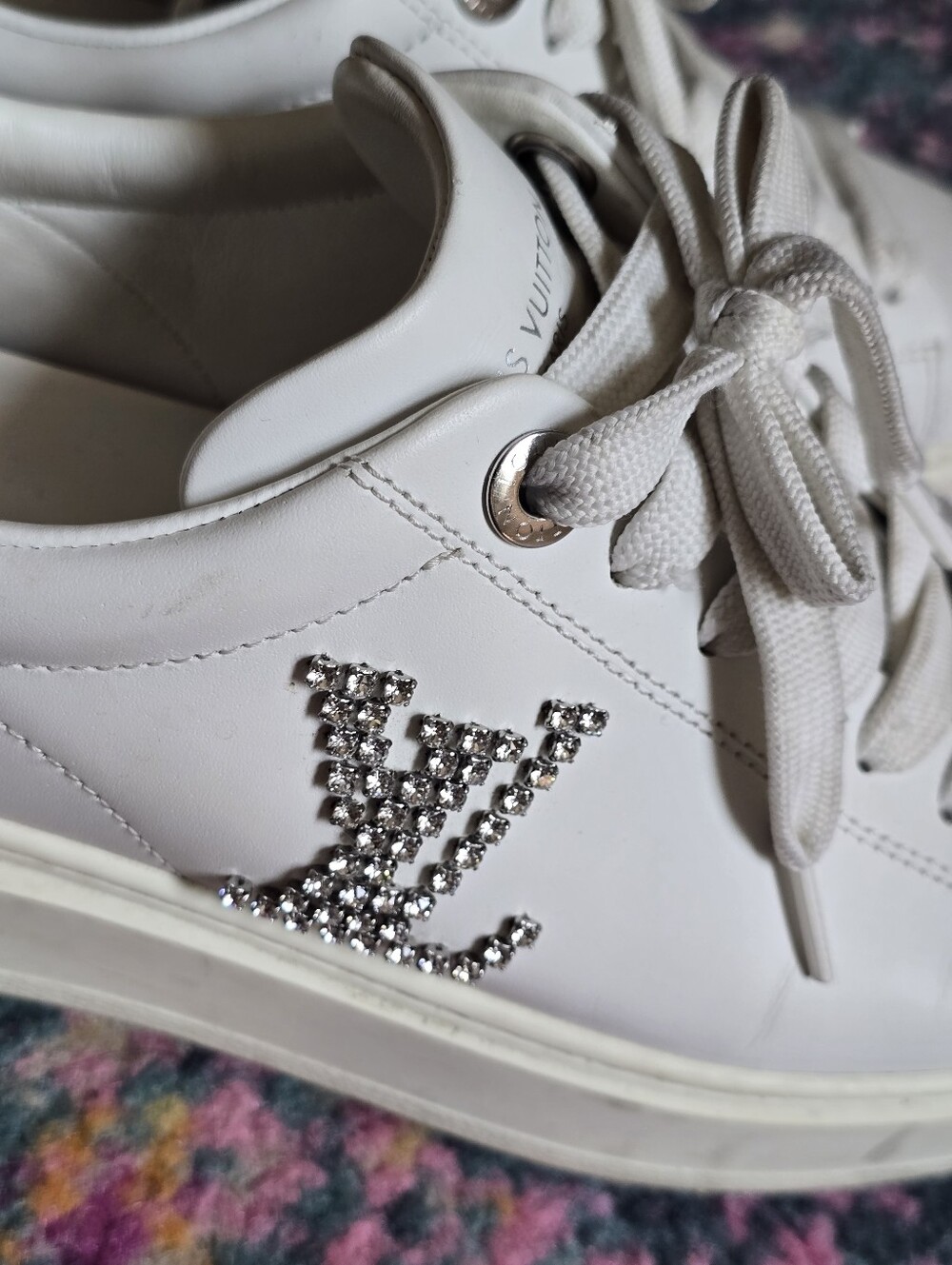 Authentic Louis Vuitton White Leather Low-Top Sneakers with Silver Accents